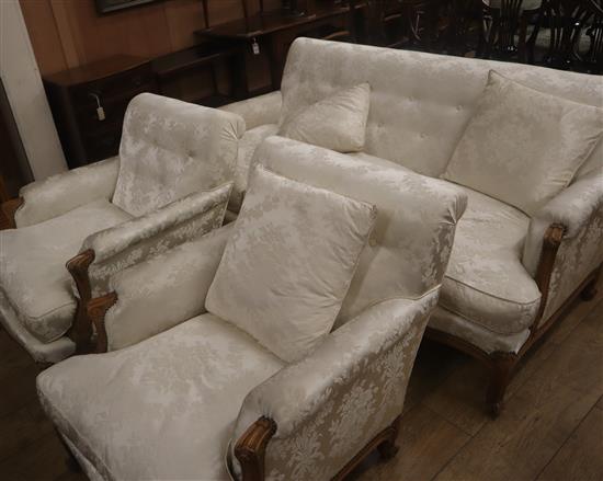 A Louis XVI design upholstered three piece suite